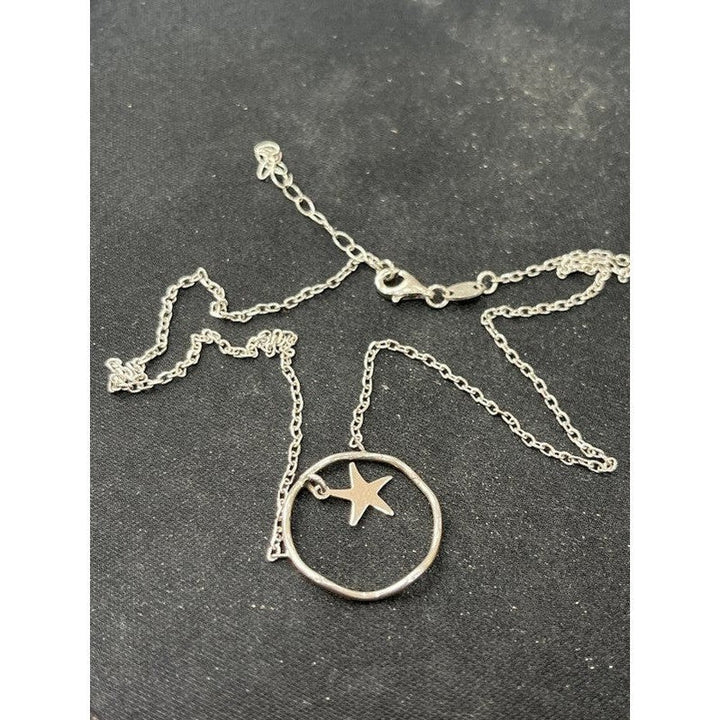 Starry Night: Sterling Silver Shiny Necklace with Round Pendant and Stars