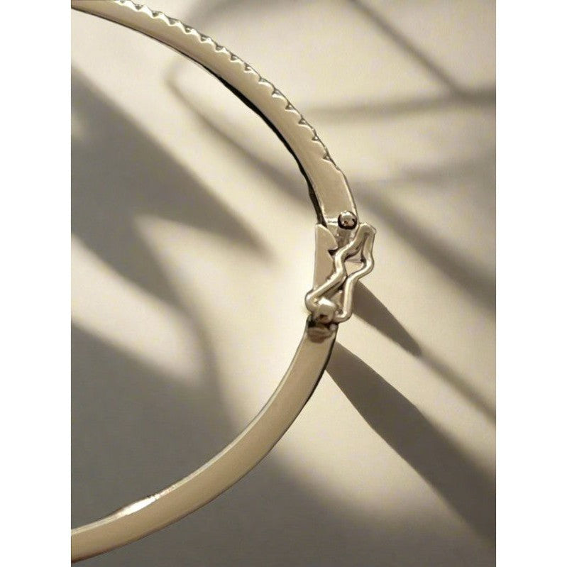 Sterling Silver Bangle with Diamond Zirconia – Classic Elegance with a Modern Twist