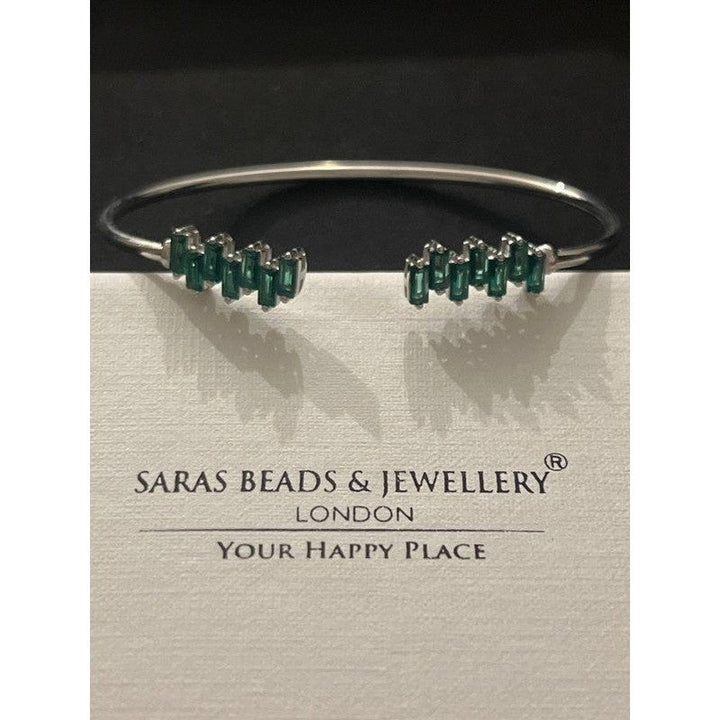 Sterling Silver Bangle with Green Zirconia Strikes – A Bold Statement Piece