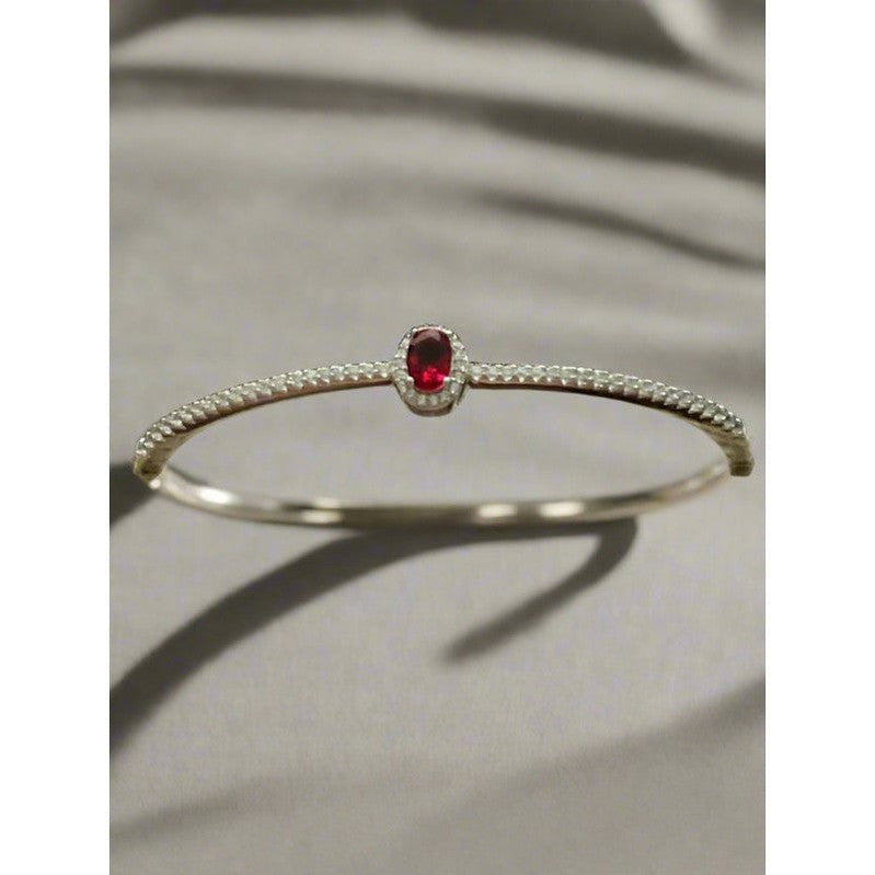 Sterling Silver Bangle with Ruby Zirconia – Classic Elegance with a Modern Twist