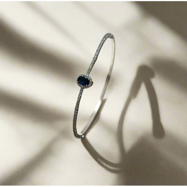 Sterling Silver Bangle with Sapphire Zirconia – Classic Elegance with a Modern Twist