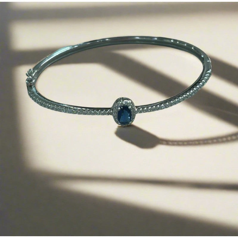 Sterling Silver Bangle with Sapphire Zirconia – Classic Elegance with a Modern Twist