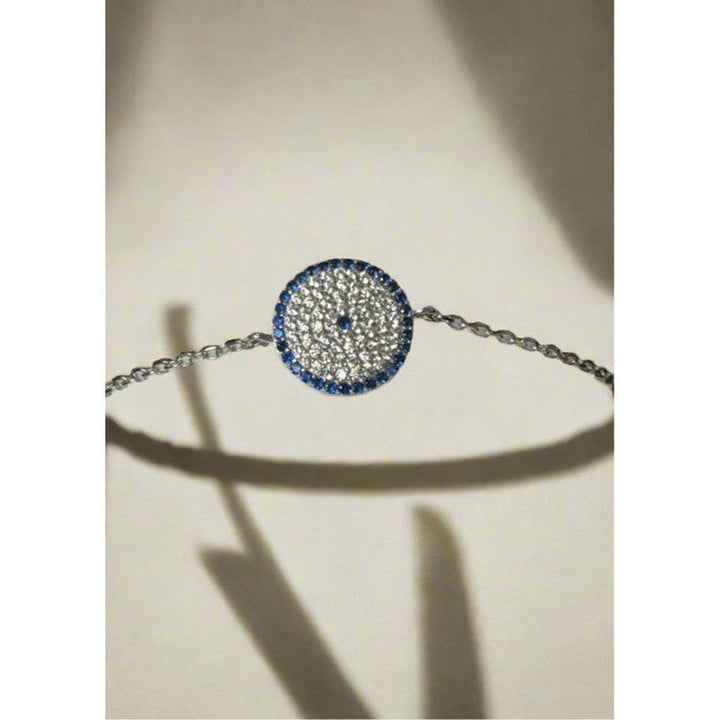 Sterling Silver Circle Bracelet with Blue Dot – A Modern Symbol of Unity