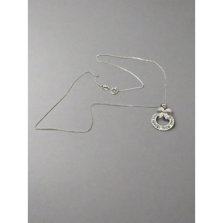 Sterling Silver Necklace with Playful Kitten Charm – A Whimsical Touch of Elegance