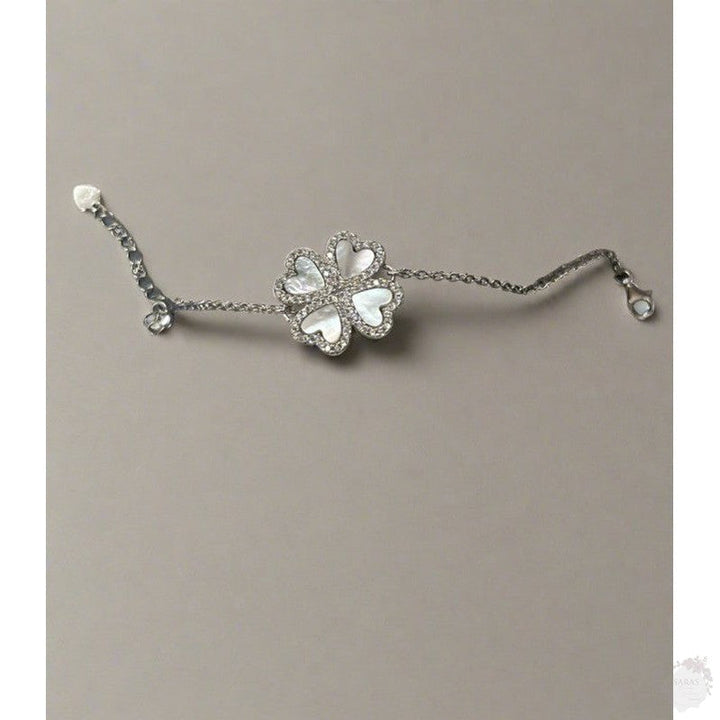 Timeless Elegance: The Sterling Silver Four-Petal Flower Bracelet