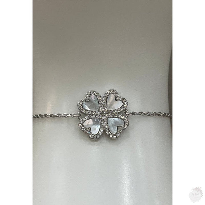 Timeless Elegance: The Sterling Silver Four-Petal Flower Bracelet