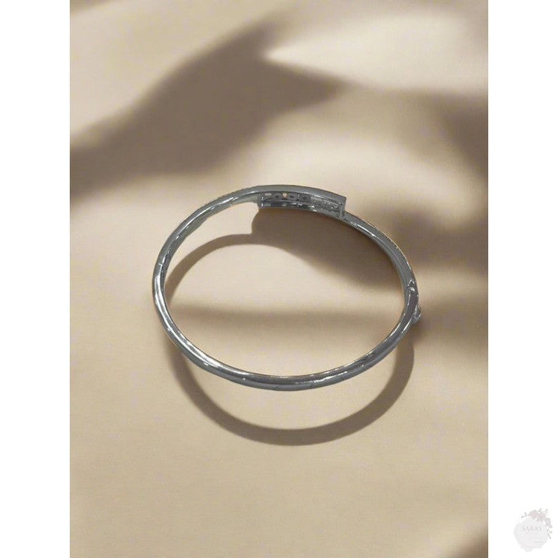 Trinity Sparkle: Rhodium-Plated Sterling Silver Bangle with Triple Dot Zirconia