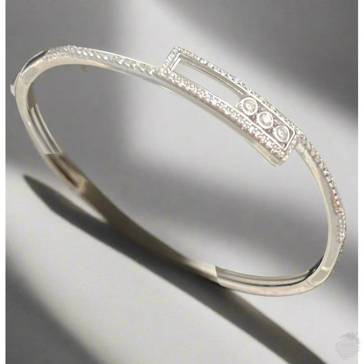 Trinity Sparkle: Rhodium-Plated Sterling Silver Bangle with Triple Dot Zirconia